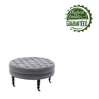 Pouf de cocktail rond en tissu Indy Porthos Home avec pieds et roulettes en bois d'hévéa